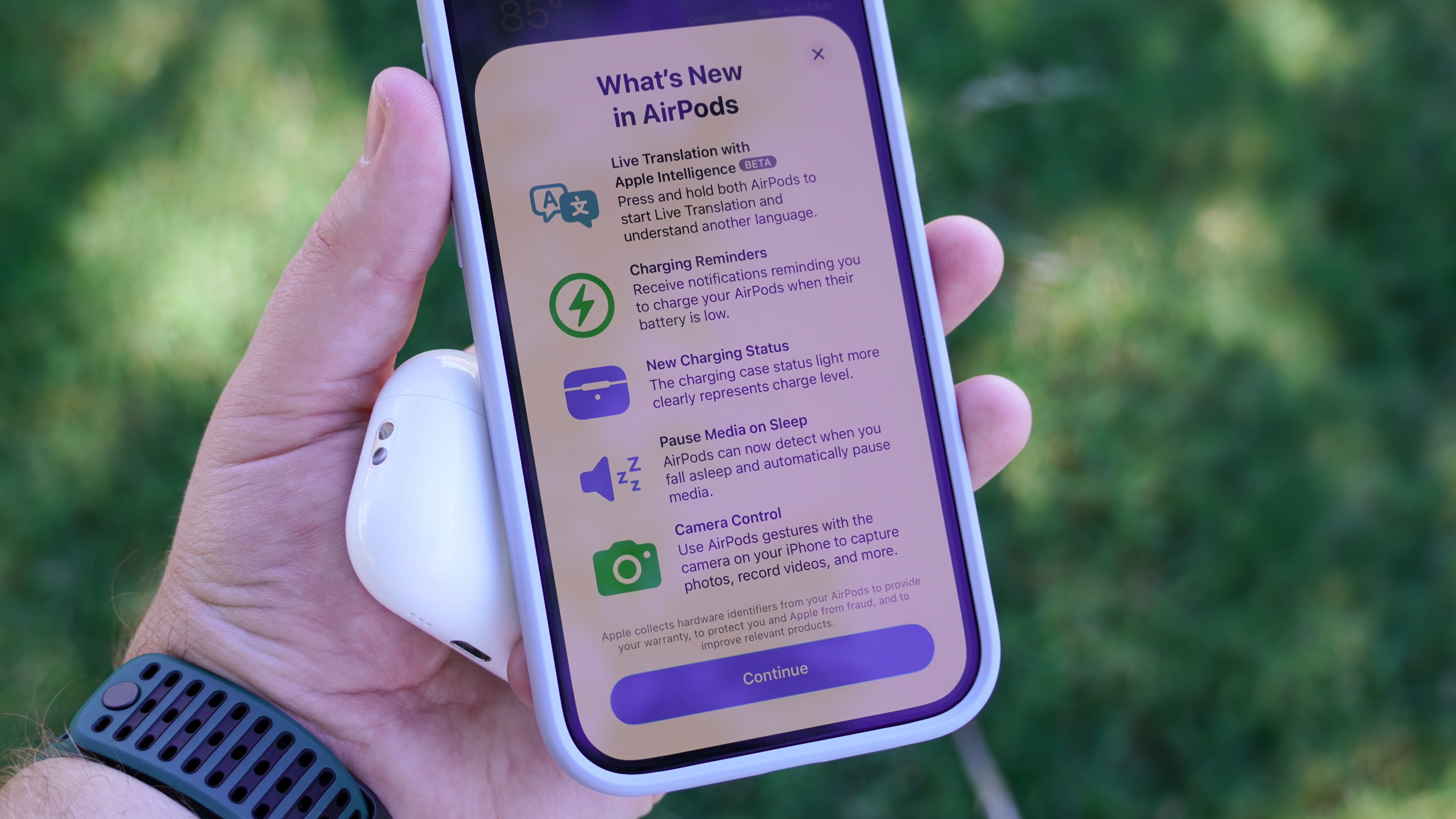 The AirPods Pro 3 with their charging case at a park.