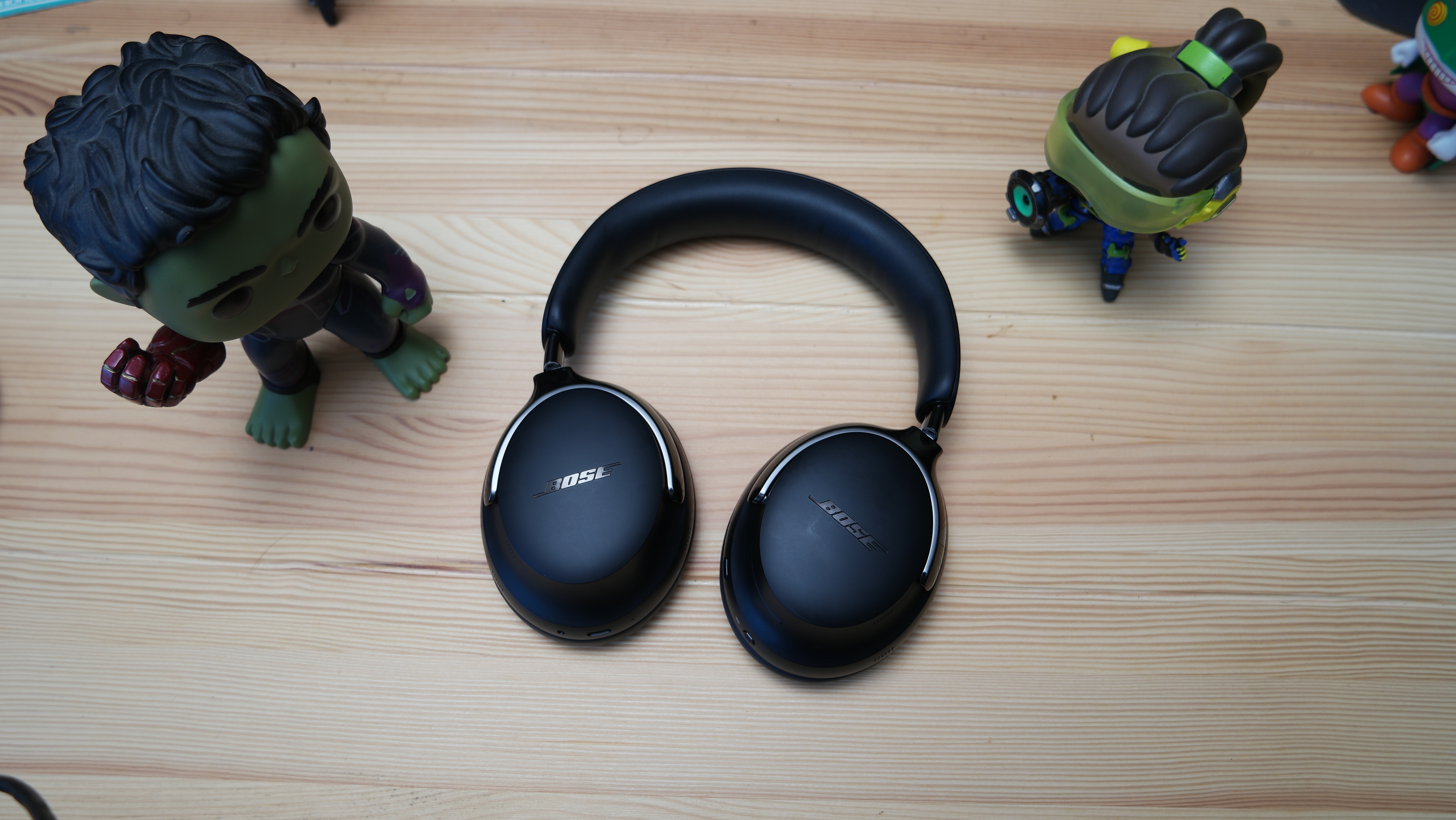 Bose QuietComfort Ultra Headphones (2nd Gen) laid flat on a table