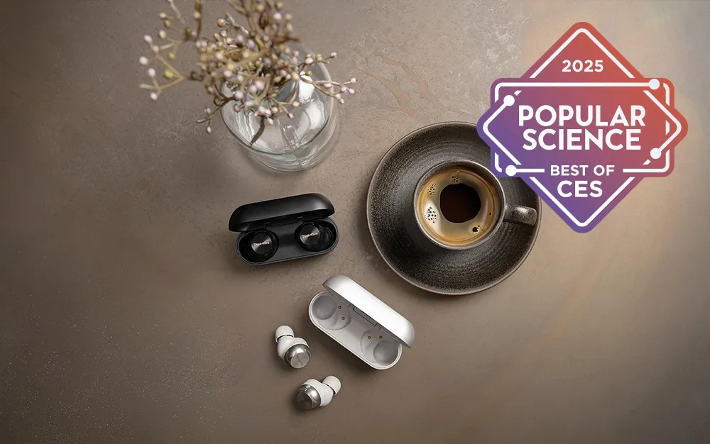 Best of winner Technics EAH-AZ100 earbuds in black and silver with coffee on a counter CES 2025