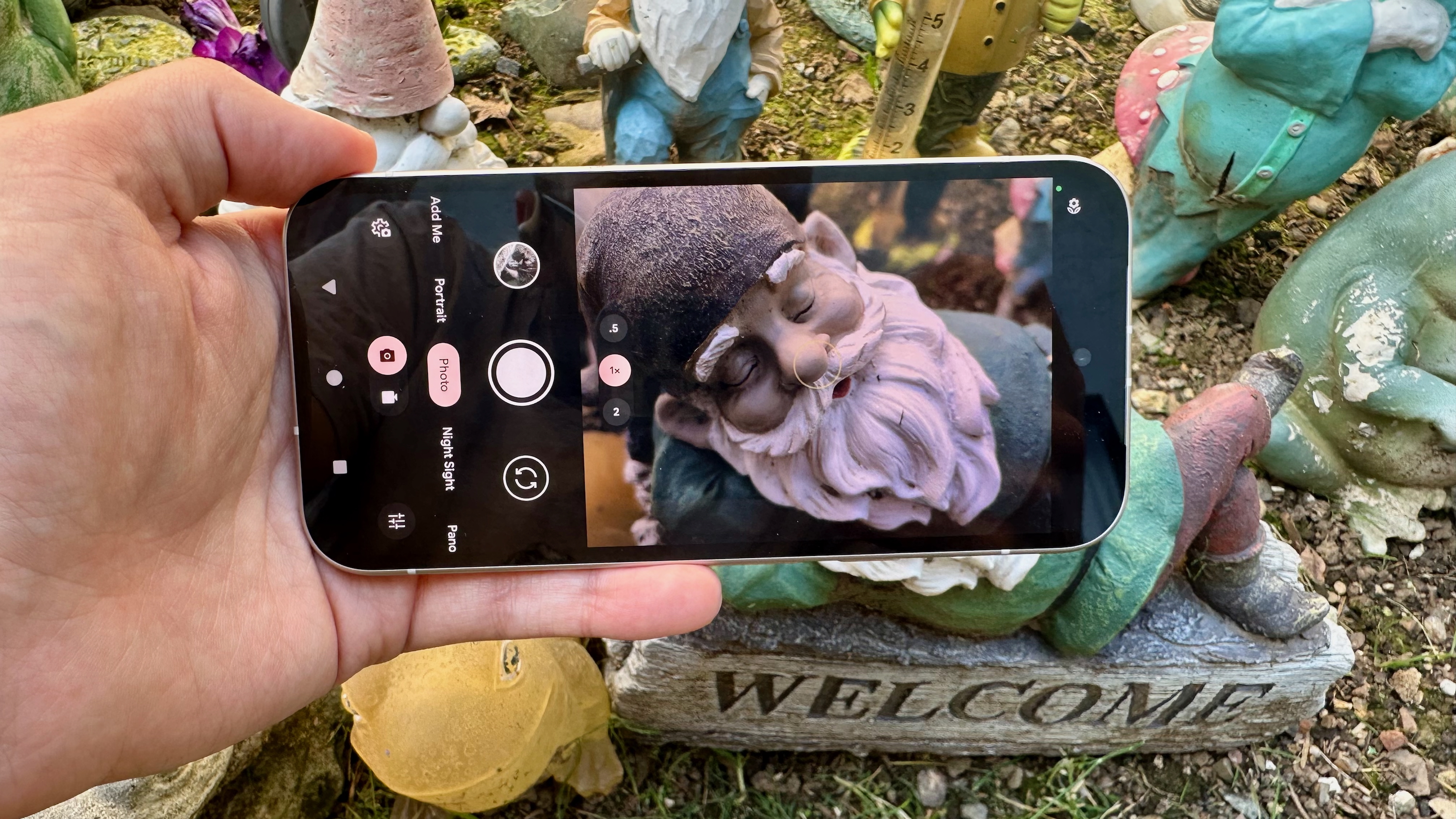 OnePlus 15R vs. Google Pixel 9a: Battle of the value phones The Google Pixel 9a camera viewfinder, with a close-up of a gnome thanks to the Macro Focus mode.