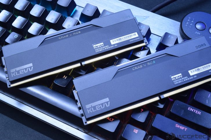 Two KLEVV CRAS V RGB DDR5 RAM sticks are placed on a keyboard with visible labels displaying model number 'KD5AG5G0C-48A580G' and specifications 'DDR5-5800 CL 40-40-40 1.45V'.