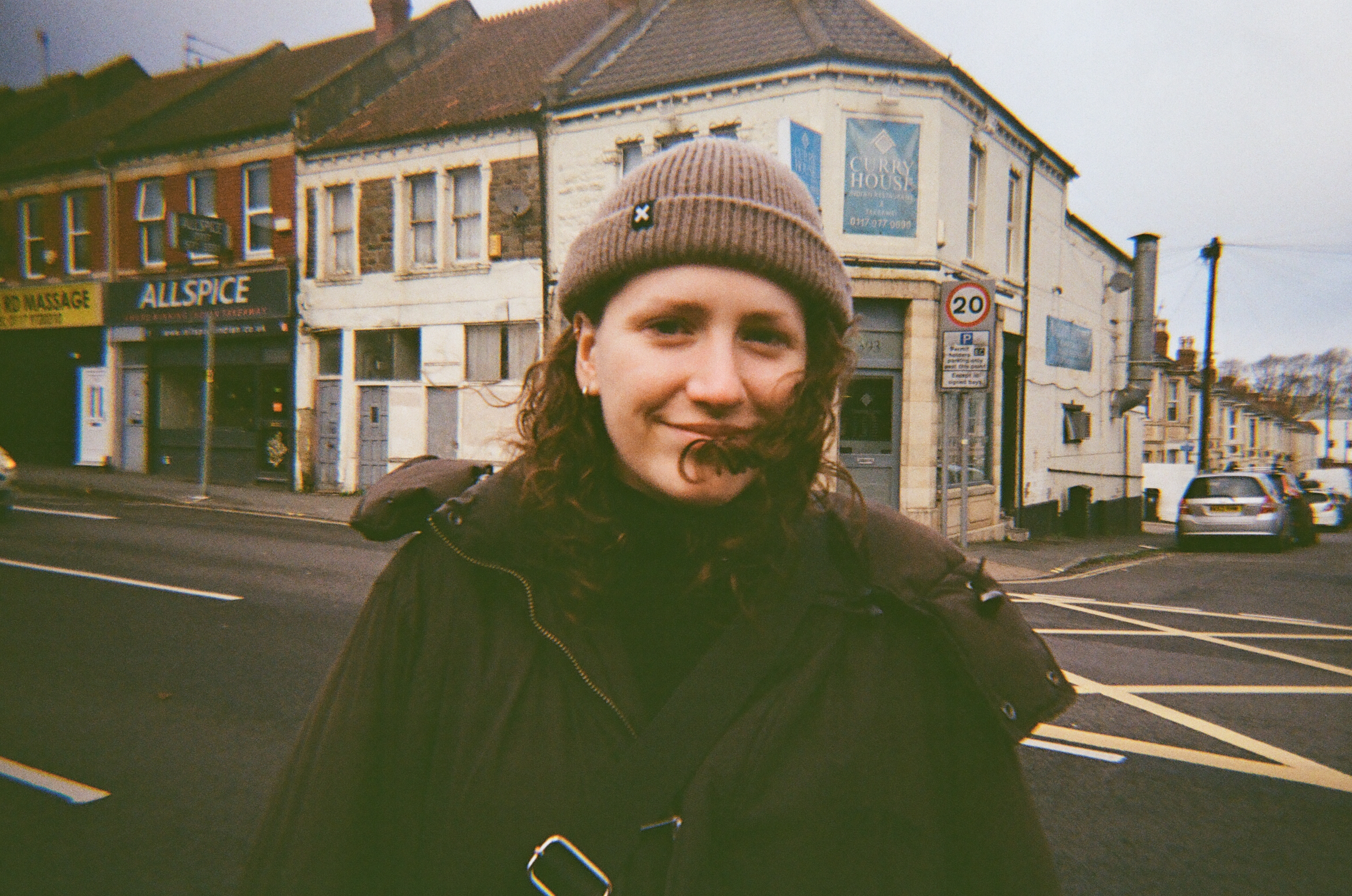 A photo of a woman taken on a Novocolor Swiss+Go 35mm film camera
