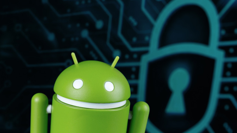 Φιγούρα ρομπότ Android μπροστά από ένα σύμβολο κλειδαριάς