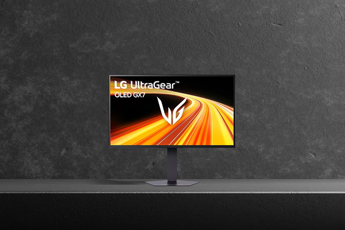Μια οθόνη LG UltraGear OLED GX7 που εμφανίζει ένα δυναμικό πορτοκαλί και κίτρινο κινούμενο γραφικό σε μια βάση σε σκούρο φόντο.
