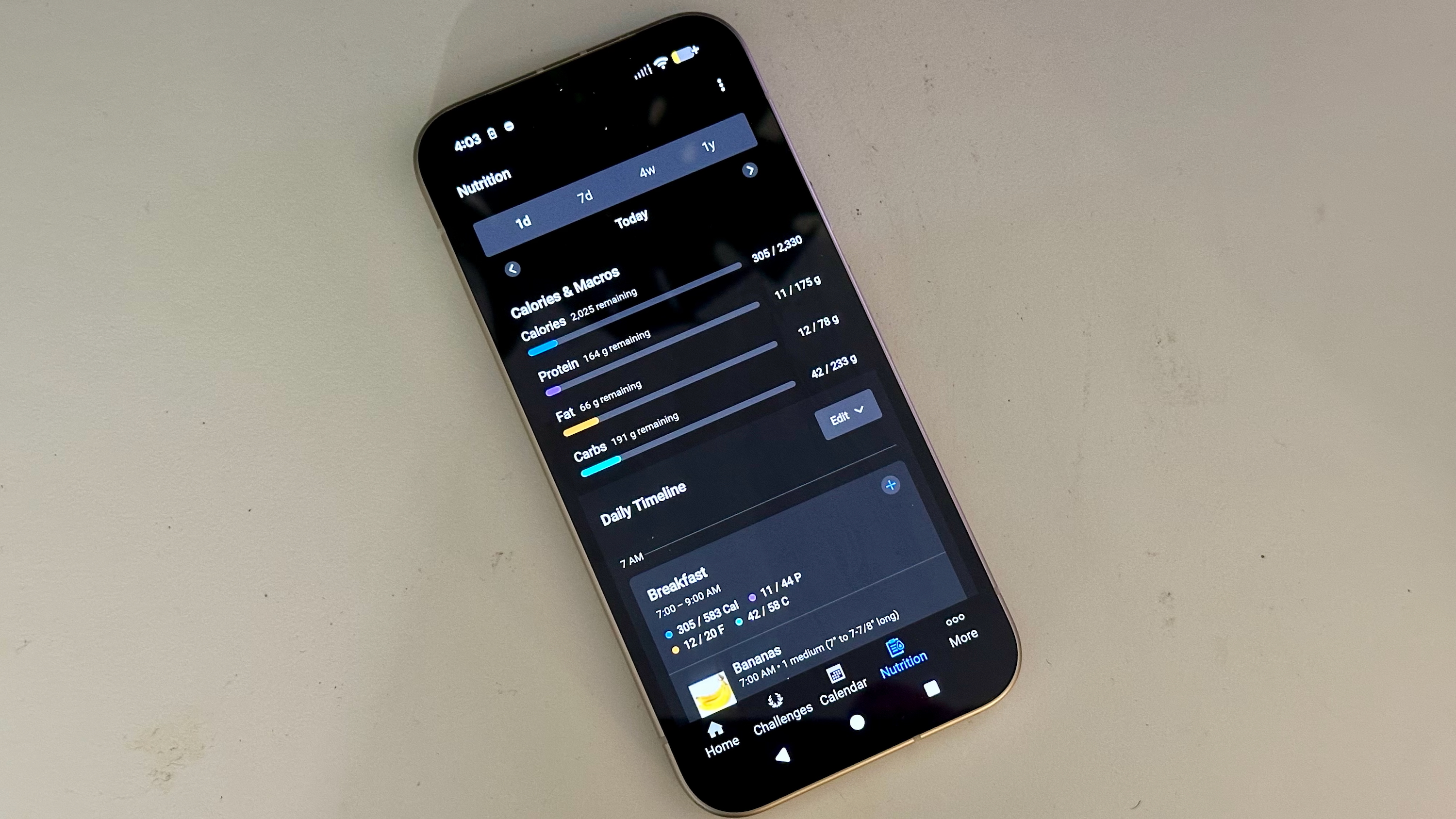 A phone showing the new Nutrition Tracking widget with Garmin Connect Plus