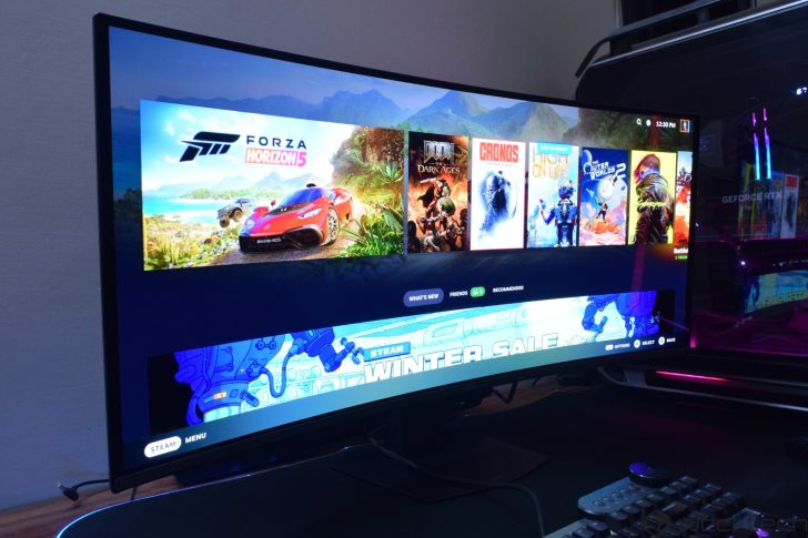 MSI MPG 341CQR X36 QD-OLED Gaming Monitor Review: Ultra-Wide Perfection With 360Hz A curved monitor displays the Steam interface showcasing games like 'Forza Horizon 5,' 'DOOM: The Dark Ages,' 'Crions,' and 'The Outer Worlds 2,' with a 'Winter Sale' banner visible.