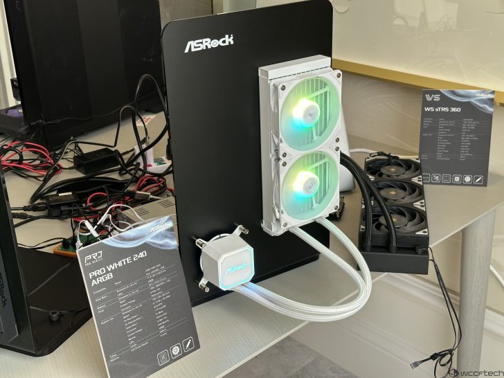 An ASRock display shows a PRO WHITE 240 ARGB cooling system with illuminated fans, accompanied by product specifications cards including 'WS ST R5 360'.