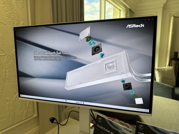 A computer monitor displays the ASRock logo and an illustration of a cooling system with the text 'Enhanced Cooling with Dual Pump,' emphasizing improved flow and reliability.