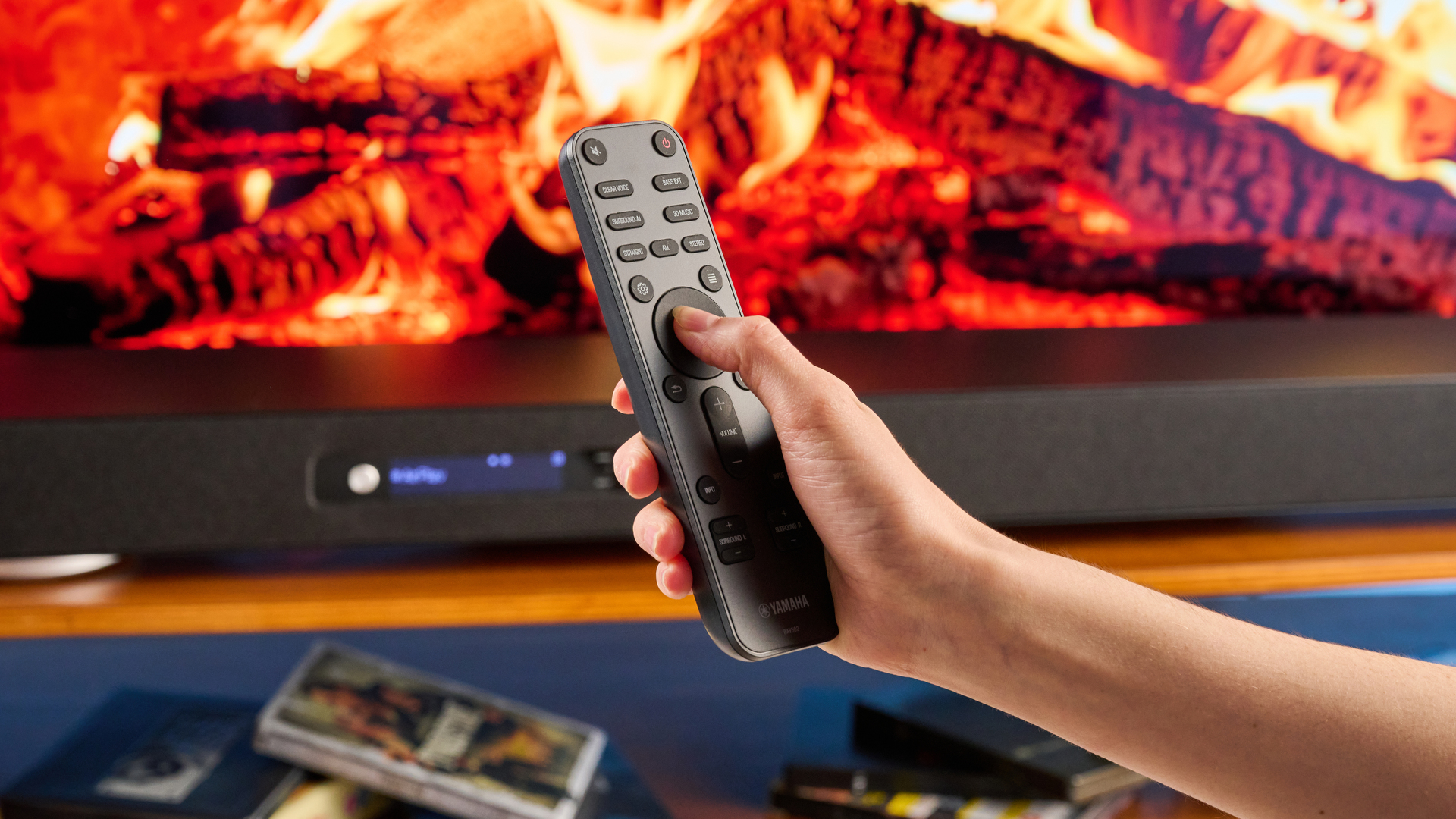 the yamaha true x surround 90a soundbar with dolby atmos, subwoofer, surround rear wireless speakers, and a 5.1.4 channel configuration photographed alongside a TV