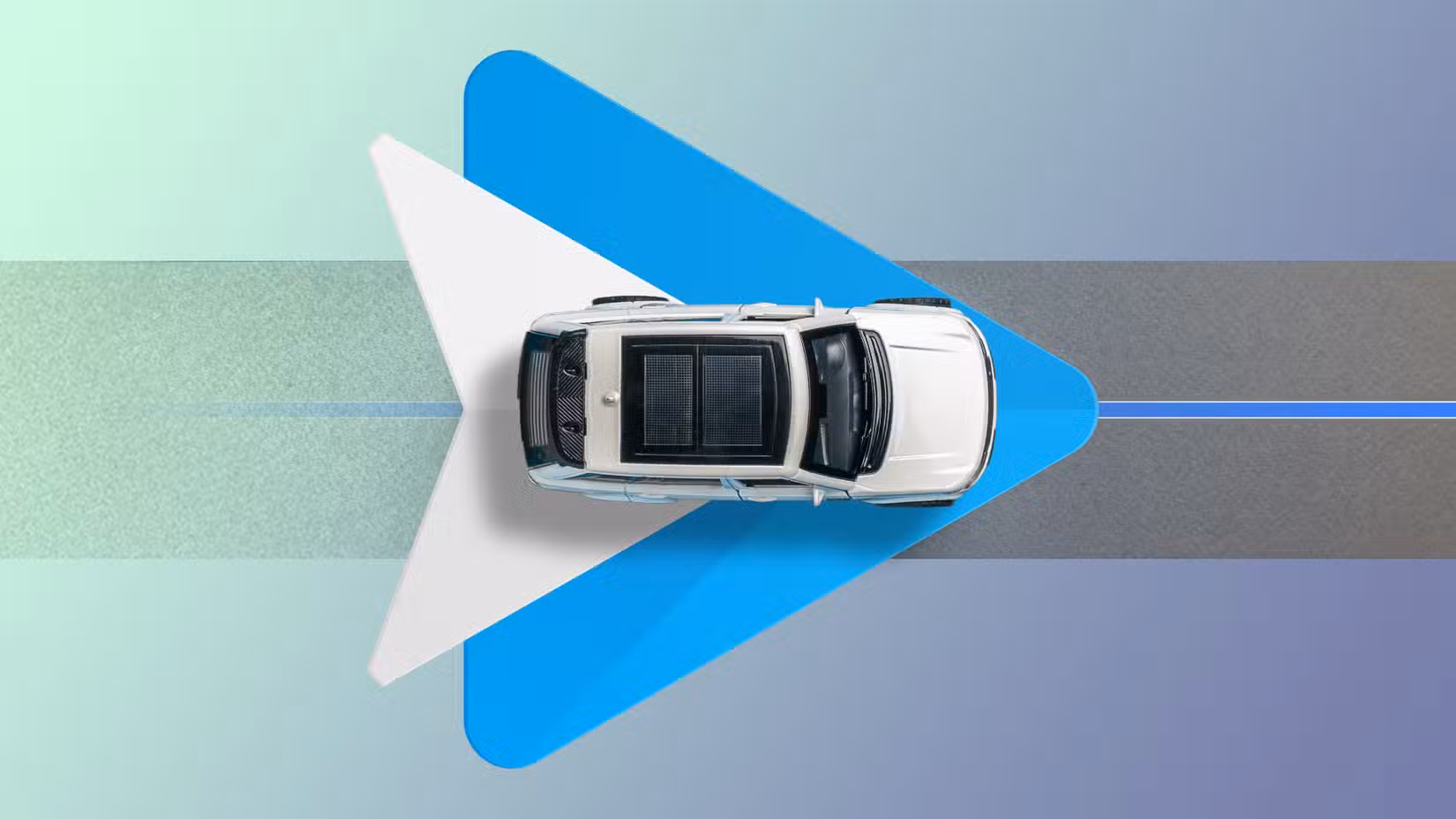 Κάτοψη ενός αυτοκινήτου που οδηγεί πάνω από το λογότυπο Android Auto